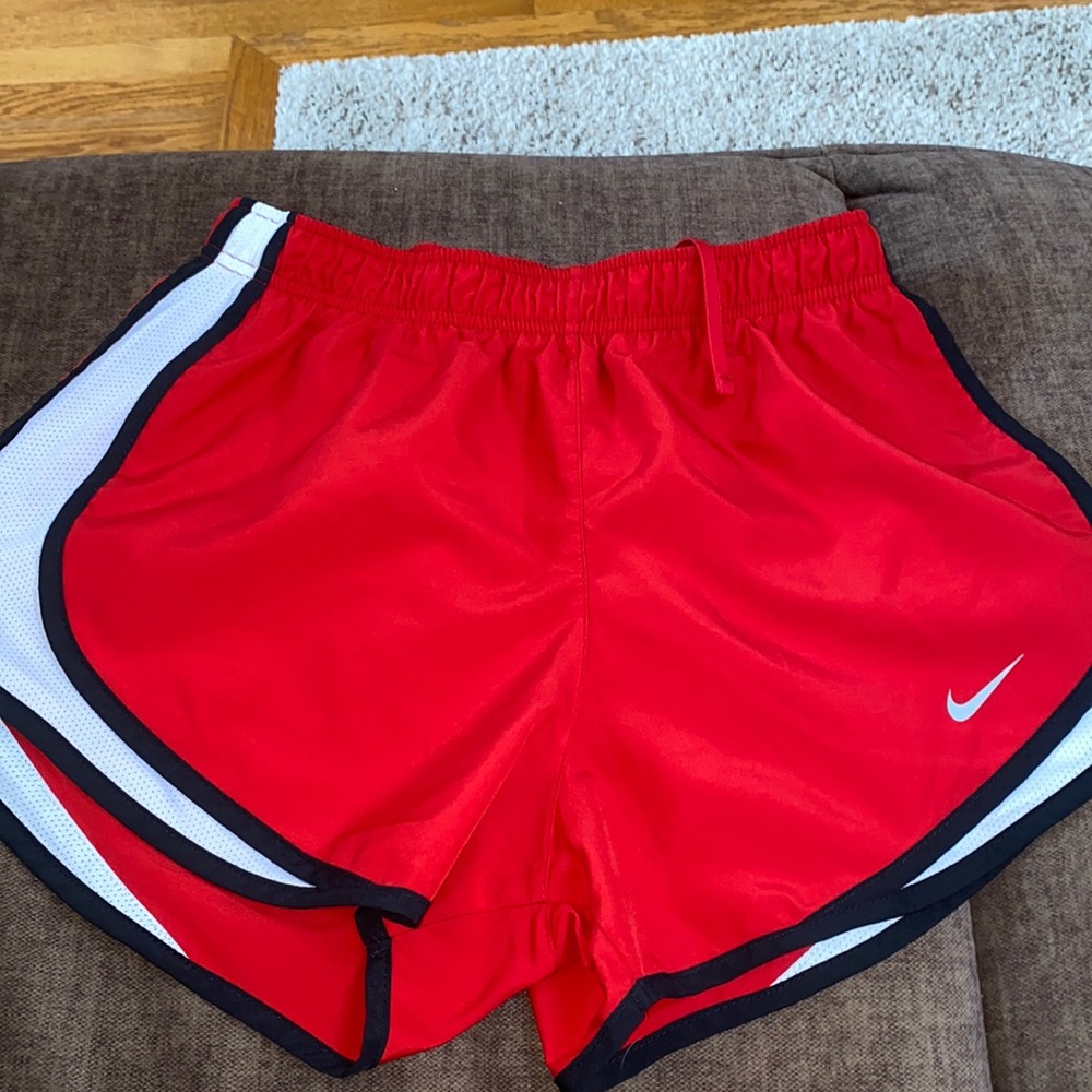 Nike red athletic shorts, great condition, size small